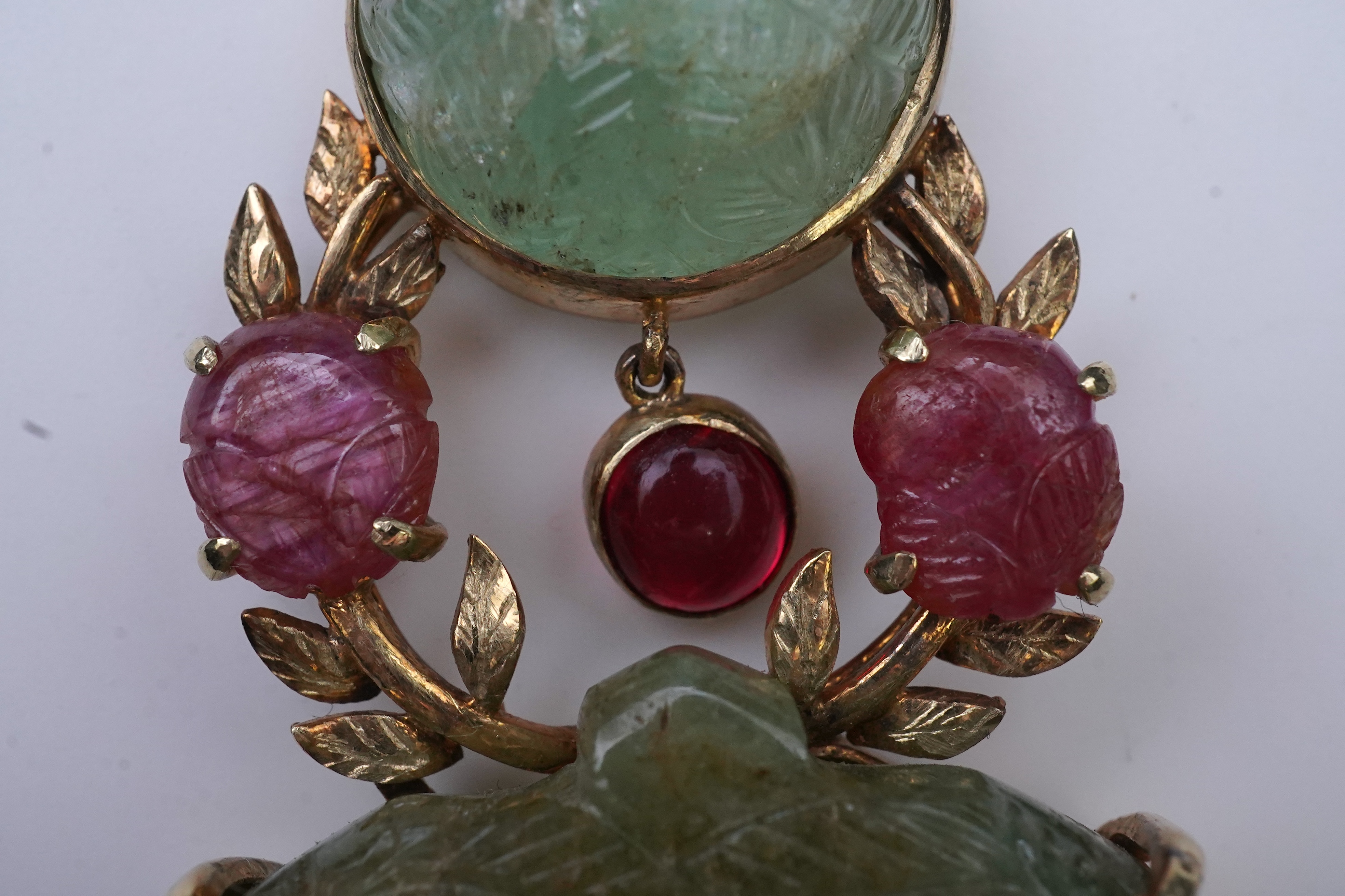 An unusual Mughal-style emerald, ruby and synthetic ruby pendant, second half 20th century